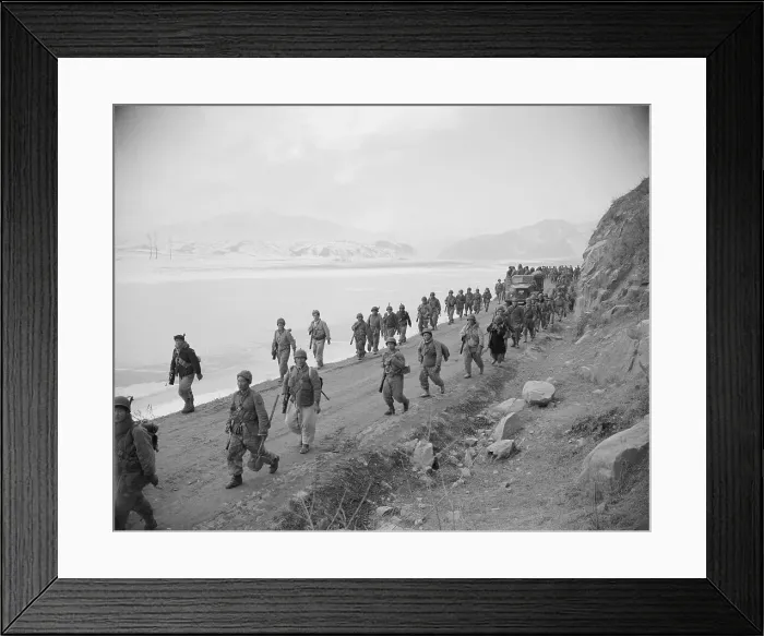 Framed Print : Tired Troops Walk Road Towards Rest Stop