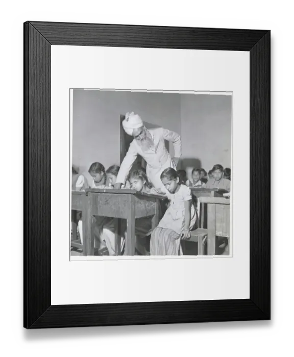 Framed Print : Man Teaching Youngsters in Classroom Framed Print : Man Teaching Youngsters in Classroom