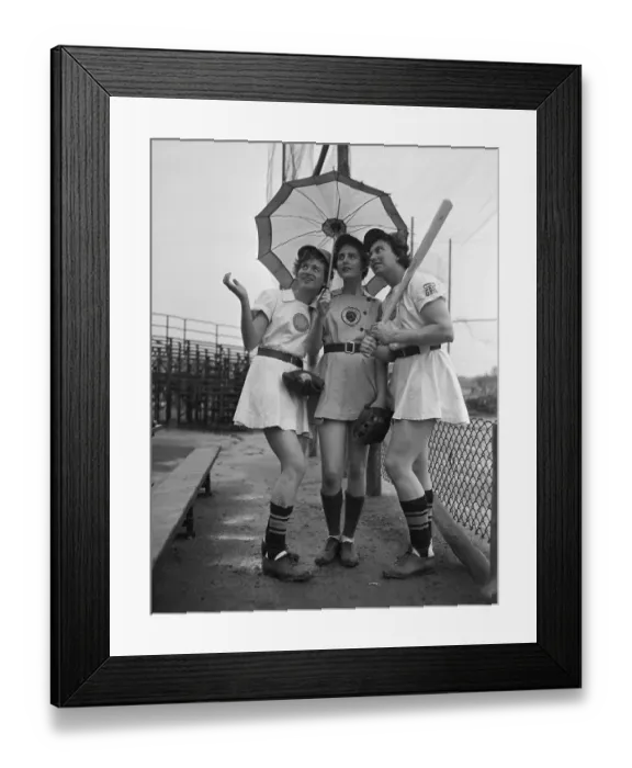 Framed Print : Women in Baseball Uniforms with Umbrella