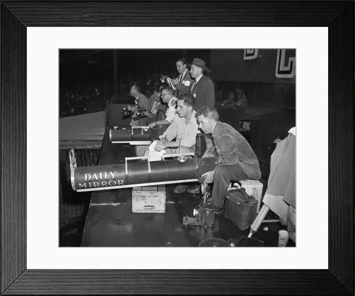 Framed Print : Phototographer Handling Cannon-Like Camera Framed Print : Phototographer Handling Cannon-Like Camera