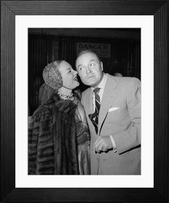 Framed Print : Carmen Miranda Whispering to Bob Hope Framed Print : Carmen Miranda Whispering to Bob Hope