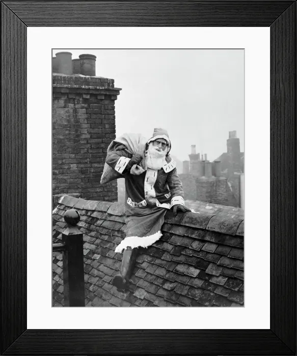 Framed Print : Santa Claus Seated on Rooftop