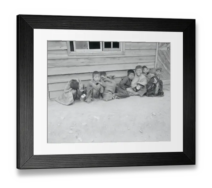 Framed Print : Young Distraught Koreans Resting Together in War Torn City Framed Print : Young Distraught Koreans Resting Together in War Torn City