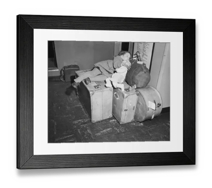 Framed Print : Girl Sleeping on Luggage at Airport Framed Print : Girl Sleeping on Luggage at Airport