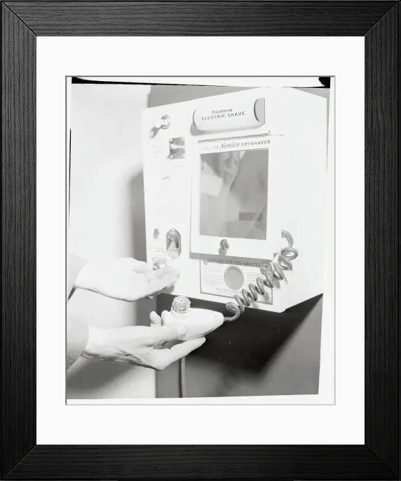 Framed Print : Hands Gripping Part of Shaving Machinery Framed Print : Hands Gripping Part of Shaving Machinery