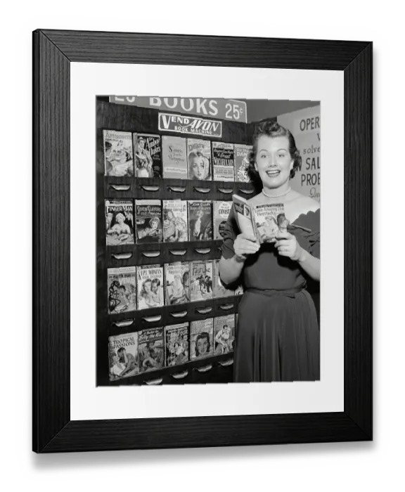 Framed Print : Woman Reading Book by Book Vending Machine Framed Print : Woman Reading Book by Book Vending Machine