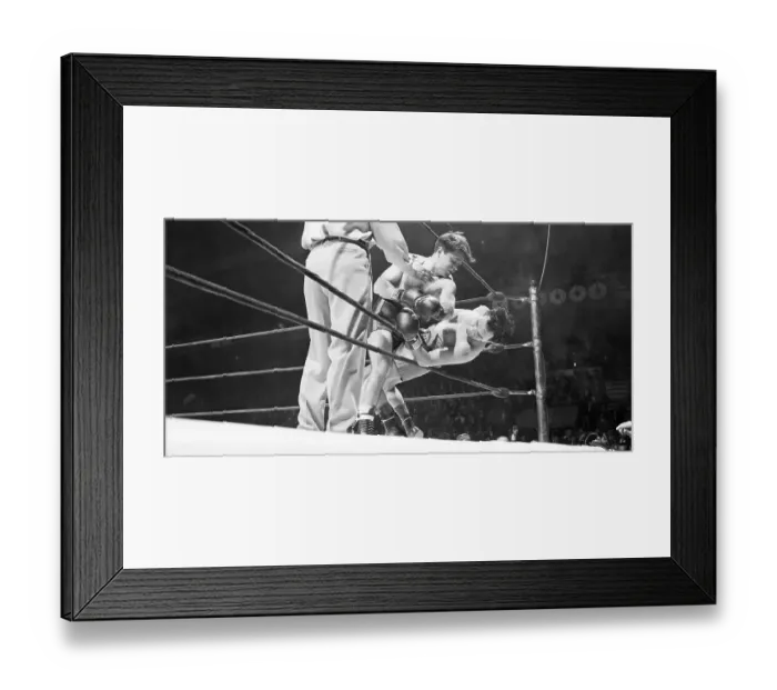 Framed Print : Boxer Against Ropes in Match Framed Print : Boxer Against Ropes in Match