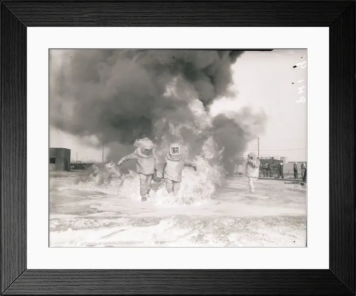 Framed Print : Navy Men Testing Fire-Proof Suits Framed Print : Navy Men Testing Fire-Proof Suits
