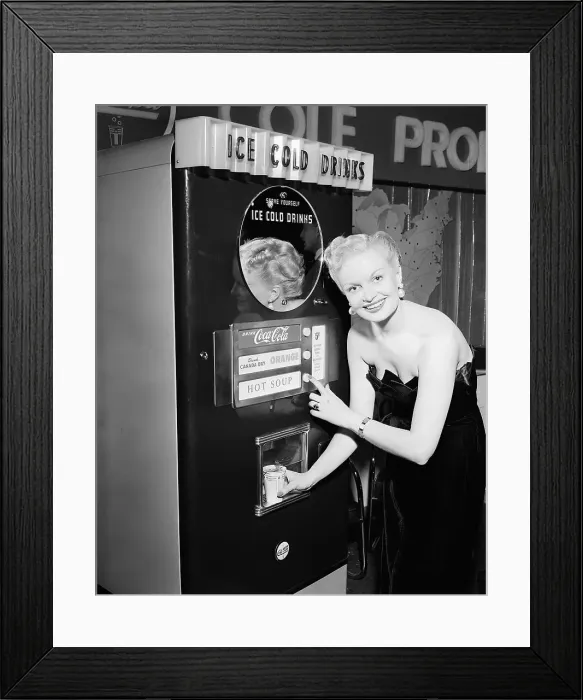 Framed Print : Woman Buying Soup from Vending Machine Framed Print : Woman Buying Soup from Vending Machine
