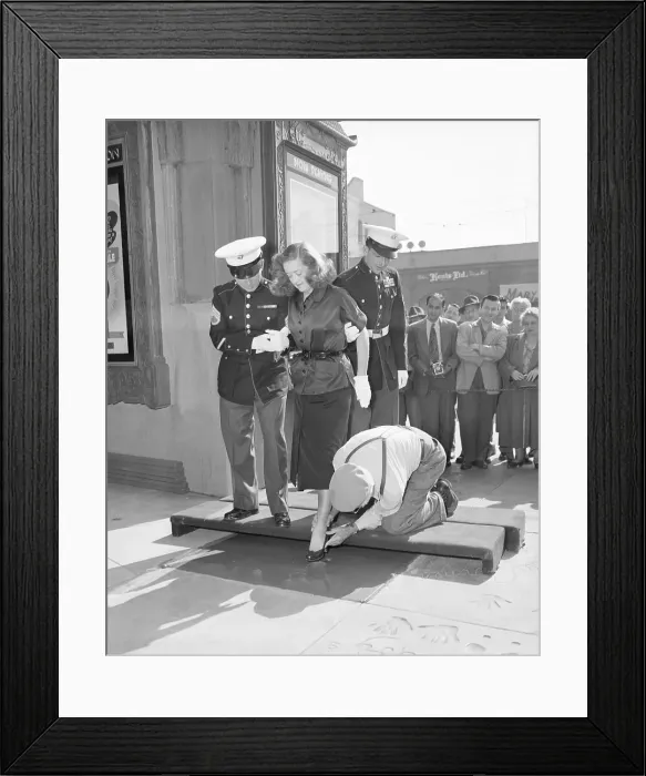 Framed Print : Bette Davis Puts Foot In Cement Framed Print : Bette Davis Puts Foot In Cement