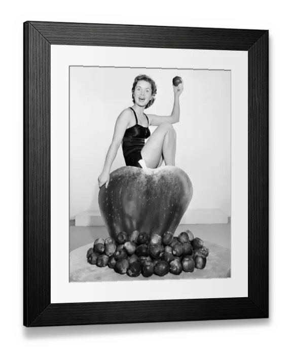 Framed Print : Portrait of Debbie Reynolds Holding Apple Framed Print : Portrait of Debbie Reynolds Holding Apple