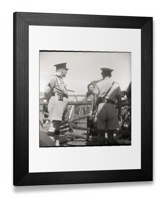 Framed Print : Chinese Woman Facing Border Patrol Framed Print : Chinese Woman Facing Border Patrol