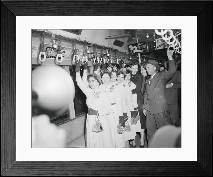 Framed Print : Dionne Quintuplets Riding on a Subway Train Framed Print : Dionne Quintuplets Riding on a Subway Train
