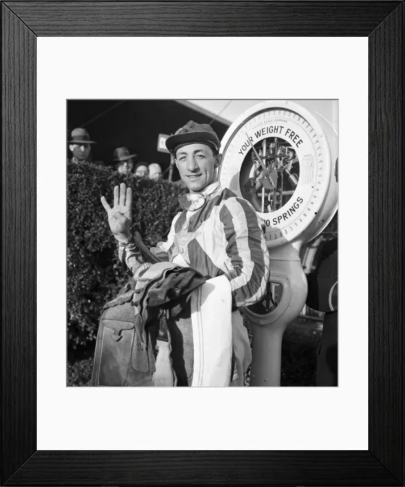 Framed Print : Eddie Arcaro Holding Up Four Fingers at Weigh In Framed Print : Eddie Arcaro Holding Up Four Fingers at Weigh In