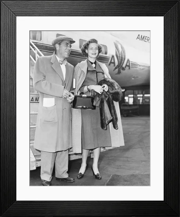 Framed Print : Humphrey Bogart and Lauren Bacall Arriving at Airport Framed Print : Humphrey Bogart and Lauren Bacall Arriving at Airport