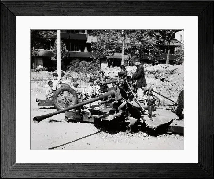 Framed Print : Children Playing On Anti-Tank Gun Framed Print : Children Playing On Anti-Tank Gun
