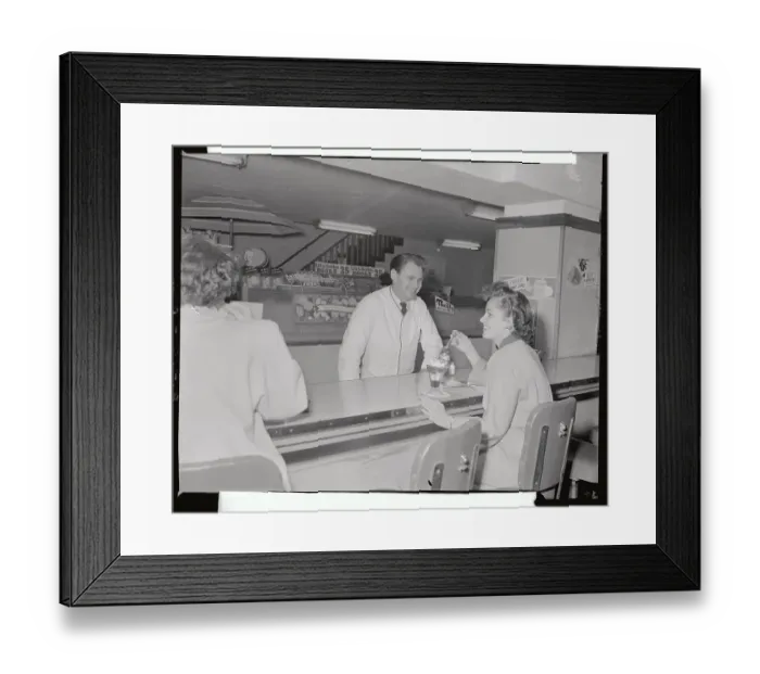 Framed Print : Man Serving Sundae to Girl in Soda Shop Framed Print : Man Serving Sundae to Girl in Soda Shop