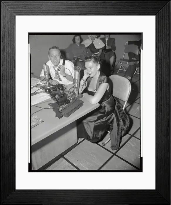 Framed Print : Judy Garland and Jack Eigen Talking in Radio Microphones Framed Print : Judy Garland and Jack Eigen Talking in Radio Microphones