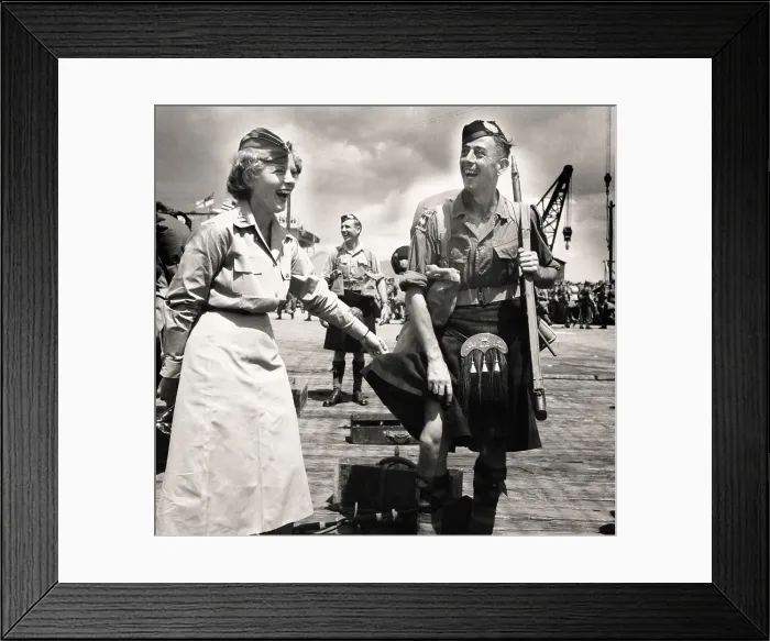 Framed Print : US Nurse Meets Kilt-Wearing Bagpiper Framed Print : US Nurse Meets Kilt-Wearing Bagpiper