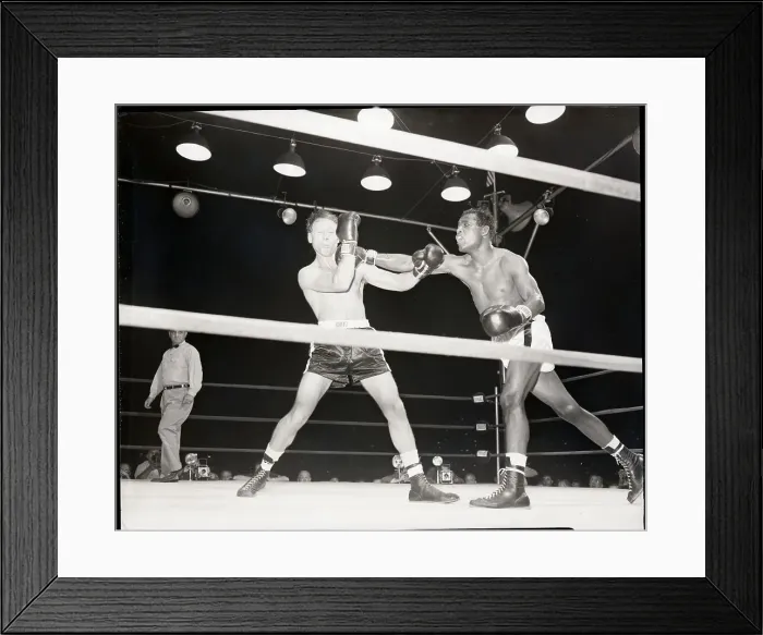 Framed Print : Sugar Ray Robinson Delivering Punch Framed Print : Sugar Ray Robinson Delivering Punch