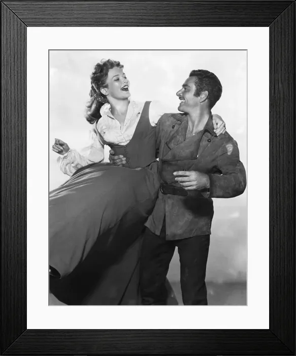 Framed Print : Errol Flynn and Patrice Wymore in Movie Still