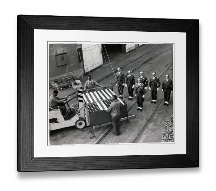 Framed Print : Longshoremen Place Forklift Under Casket