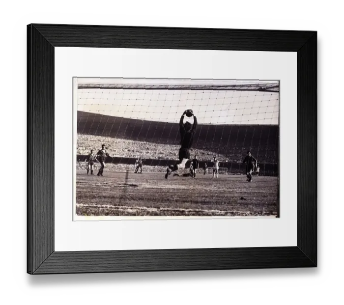 Framed Print : Goalie Jumps to Catch the Ball Framed Print : Goalie Jumps to Catch the Ball