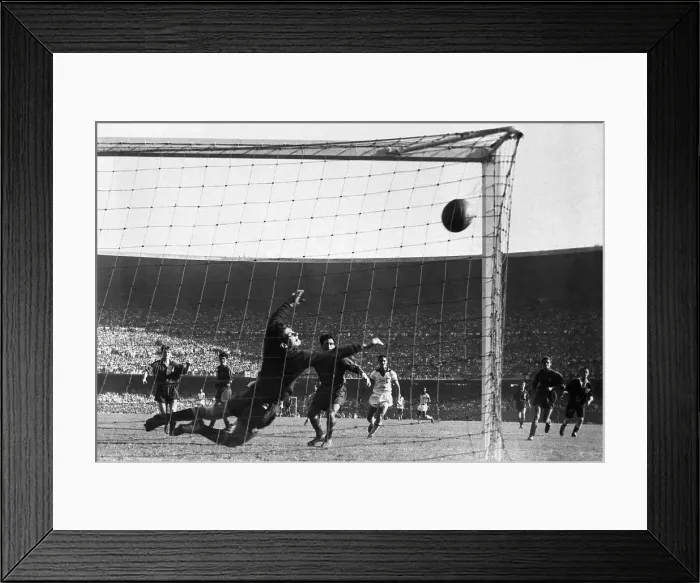 Framed Print : Goalie Leaping to Block Soccer Ball Framed Print : Goalie Leaping to Block Soccer Ball