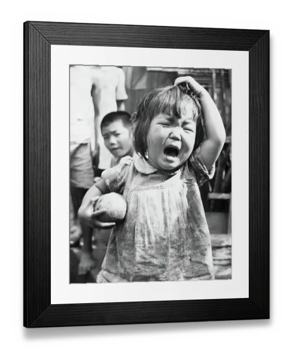 Framed Print : Toddler with Orange Crying Framed Print : Toddler with Orange Crying