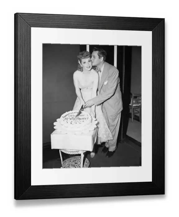 Framed Print : Performer Desi Arnaz Kissing Lucille Ball as They Prepare to Cut Cake Framed Print : Performer Desi Arnaz Kissing Lucille Ball as They Prepare to Cut Cake