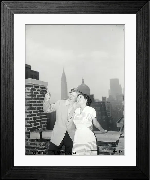 Framed Print : Boy Showing Girl Sights Atop Hotel Framed Print : Boy Showing Girl Sights Atop Hotel