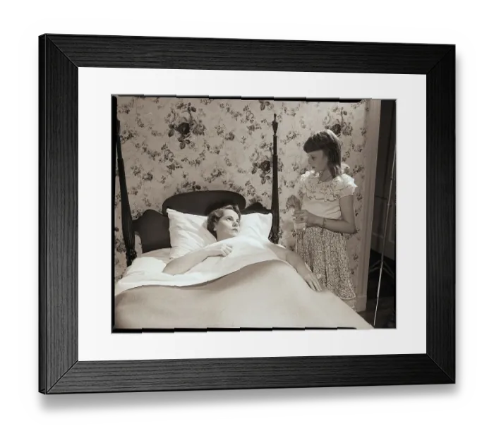 Framed Print : Girl Stands at Bedside of Sick Woman Framed Print : Girl Stands at Bedside of Sick Woman