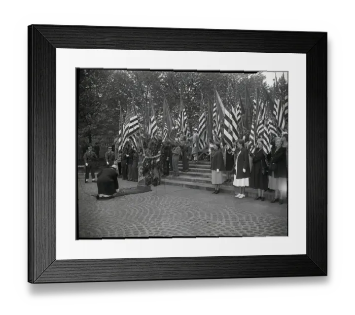 Framed Print : Woman Placing Flower On Veteran Grave Framed Print : Woman Placing Flower On Veteran Grave