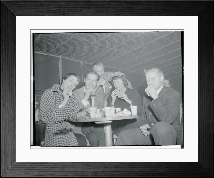 Framed Print : People Eating Hot Dogs Framed Print : People Eating Hot Dogs
