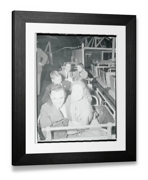 Framed Print : Debutantes and Their Escorts Riding Roller Coaster Framed Print : Debutantes and Their Escorts Riding Roller Coaster