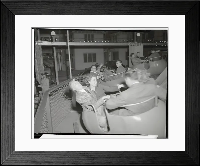 Framed Print : Couples Riding Amusement Park Ride Framed Print : Couples Riding Amusement Park Ride