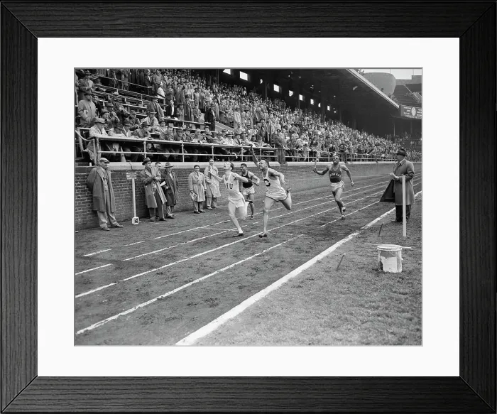 Framed Print : Runners Crossing Finish Line in College Relay Championship Framed Print : Runners Crossing Finish Line in College Relay Championship