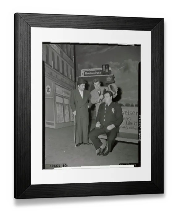Framed Print : Charlie Chaplin, Jr. with Seated Actor Framed Print : Charlie Chaplin, Jr. with Seated Actor