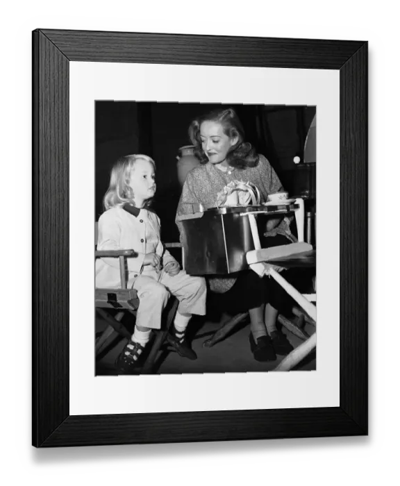 Framed Print : Actress Bette Davis With Her Young Daughter Framed Print : Actress Bette Davis With Her Young Daughter