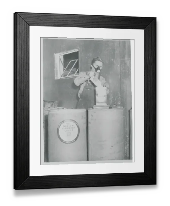 Framed Print : Health Department Worker Adding Fluorine to Water Tank Framed Print : Health Department Worker Adding Fluorine to Water Tank