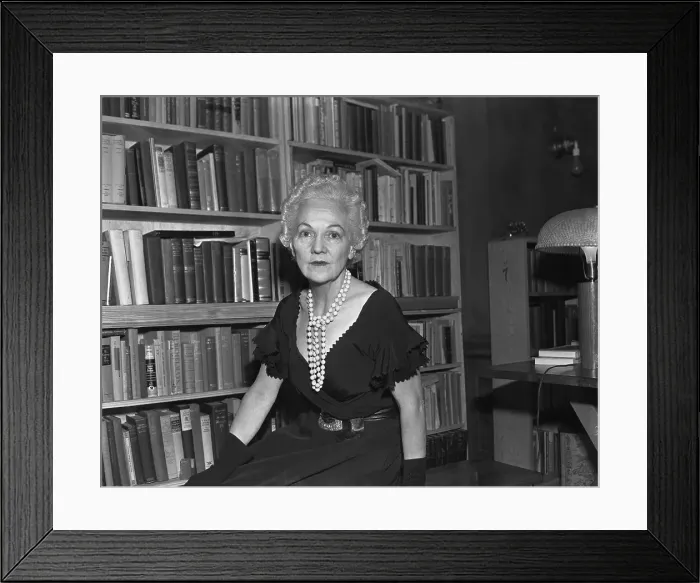 Framed Print : Katherine Anne Porter Sitting by Bookshelf Framed Print : Katherine Anne Porter Sitting by Bookshelf