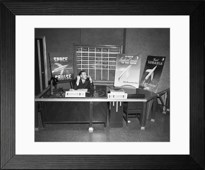 Framed Print : Clerk Taking Space Travel Reservations Framed Print : Clerk Taking Space Travel Reservations