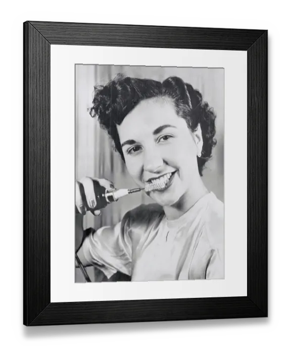 Framed Print : Girl Demonstrating Rotary Toothbrush Framed Print : Girl Demonstrating Rotary Toothbrush