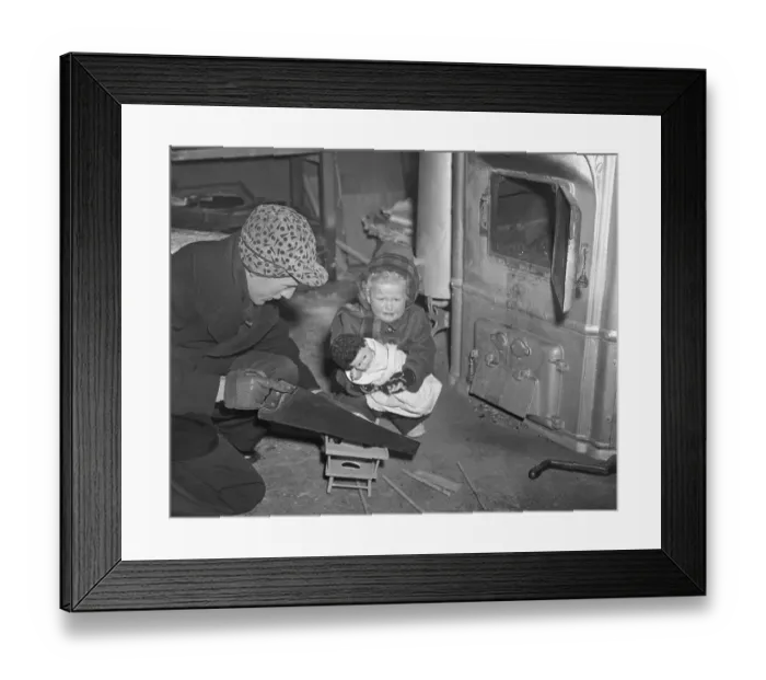 Framed Print : Father Uses Toy High Chair for Fuel During Coal Strike