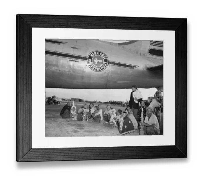 Framed Print : Returning Exiles Sitting by Plane Framed Print : Returning Exiles Sitting by Plane
