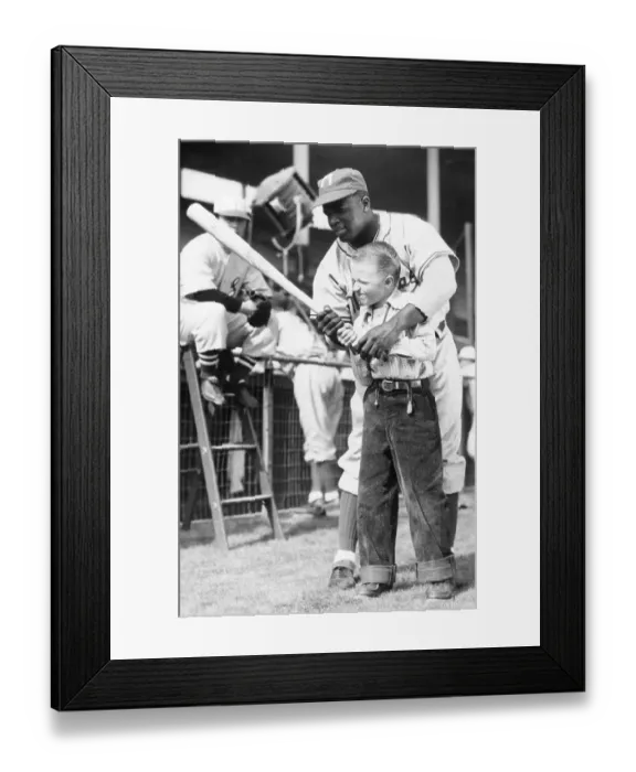 Framed Print : Jackie Robinson Teaching a Young Boy How to Hold a Baseball Bat Framed Print : Jackie Robinson Teaching a Young Boy How to Hold a Baseball Bat