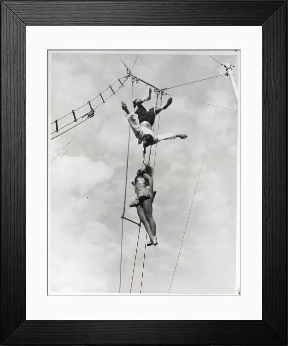 Framed Print : Man And Woman Doing High Wire Act