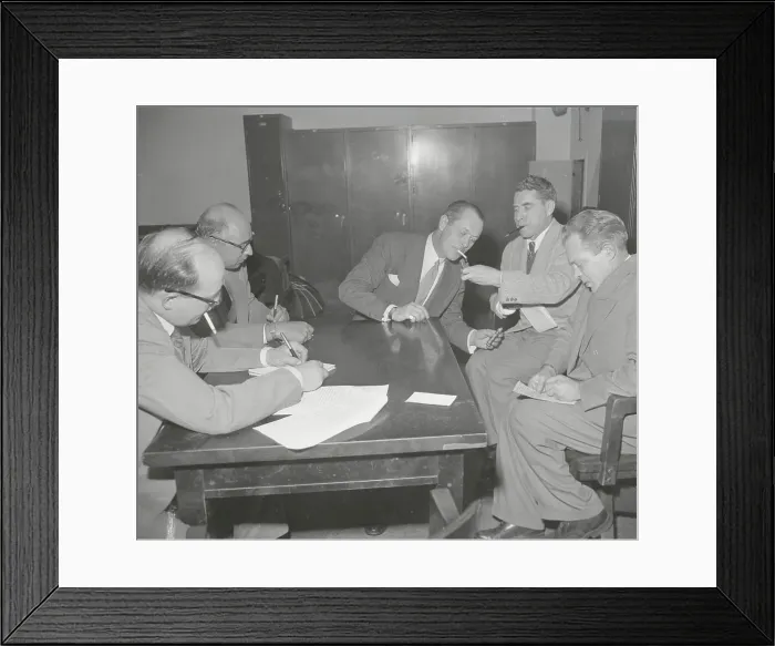 Framed Print : Reporter Lighting Cigarette for Robert Montgomery Framed Print : Reporter Lighting Cigarette for Robert Montgomery