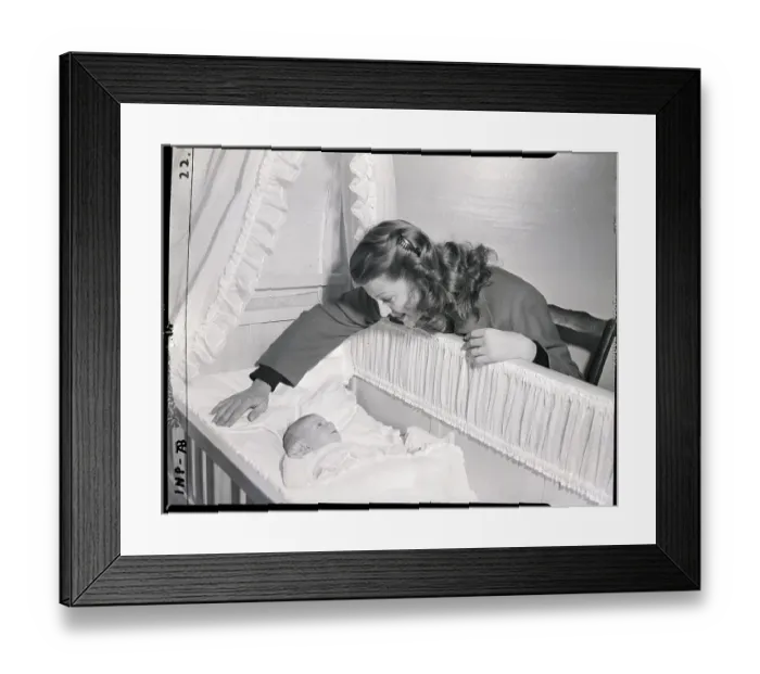 Framed Print : Rita Hayworth Standing Over Princess Yasmin Framed Print : Rita Hayworth Standing Over Princess Yasmin