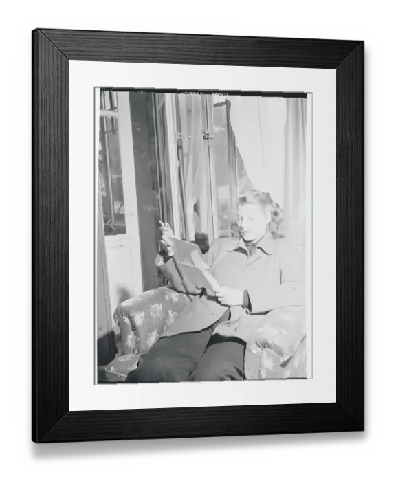 Framed Print : Rita Hayworth Reading Papers